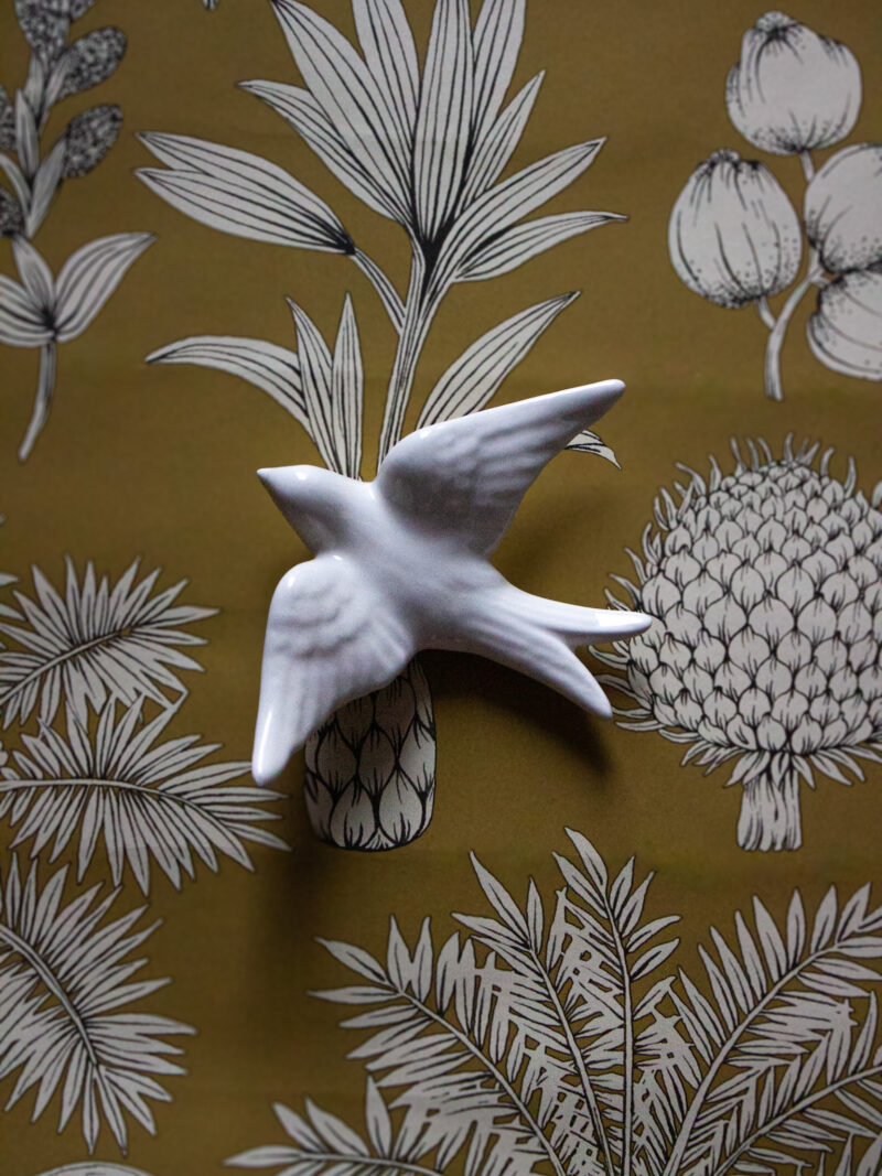 white ceramic swallow